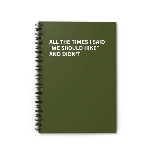 Green spiral notebook with the title 'All the Times I Said We Should Hike and Didn't' on the cover.