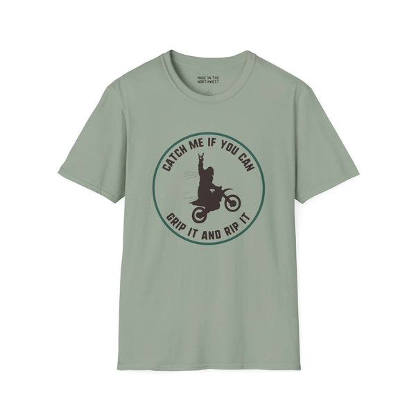 Catch Me If You Can Bigfoot motocross softstyle t-shirt in green, featuring a riding Sasquatch graphic.