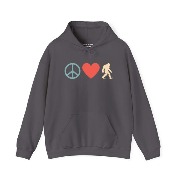 Peace, Love, and Bigfoot Cozy Hoodie featuring symbols of peace, love, and Bigfoot on a dark hoodie.