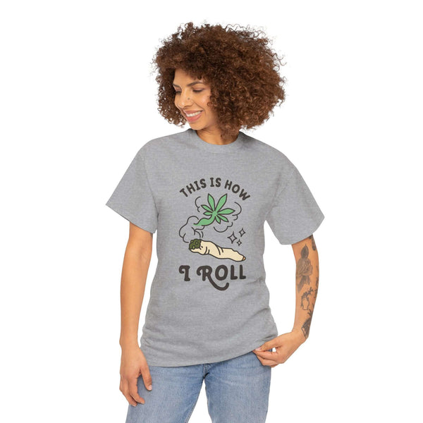 Woman wearing "This is How I Roll" athletic tee with marijuana joint graphic, gray shirt conveying laid-back vibes and style.