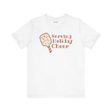 Serving Holiday Cheer Pickleball T Shirt featuring a festive design with a paddle and Christmas lights.
