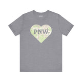Premium soft tee featuring a topo map heart design with 'PNW' for Pacific Northwest adventure lovers.