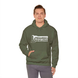 Man wearing green 'Homegrown in the Northwest' hoodie featuring an axe design, celebrating Pacific Northwest lifestyle.