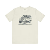 Legends Always Leak a Little tee featuring Land Rover Series II graphic on a soft cream shirt.