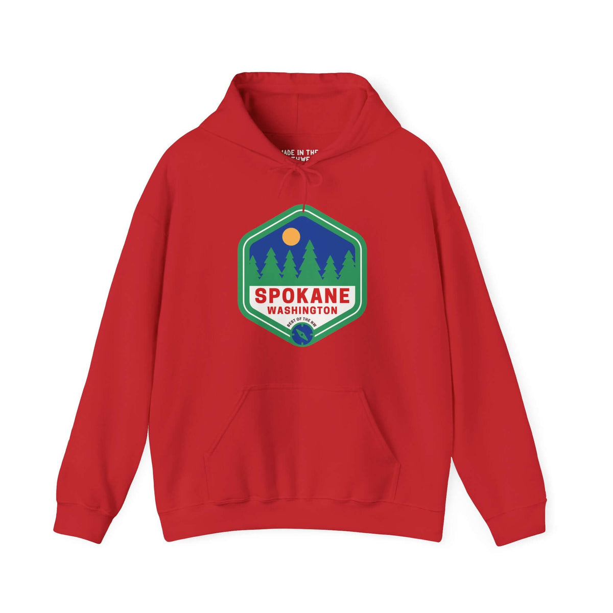 Red Spokane hoodie with retro 90s badge featuring trees, celebrating outdoor beauty and community spirit of Lilac City, Washington.