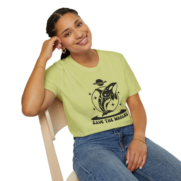 Woman wearing a light green Save the Whales Orca Softstyle T-Shirt featuring a stylish orca graphic.