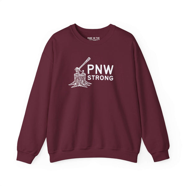 PNW Strong Crewneck Sweatshirt featuring axe-in-stump design in maroon, representing Pacific Northwest spirit.