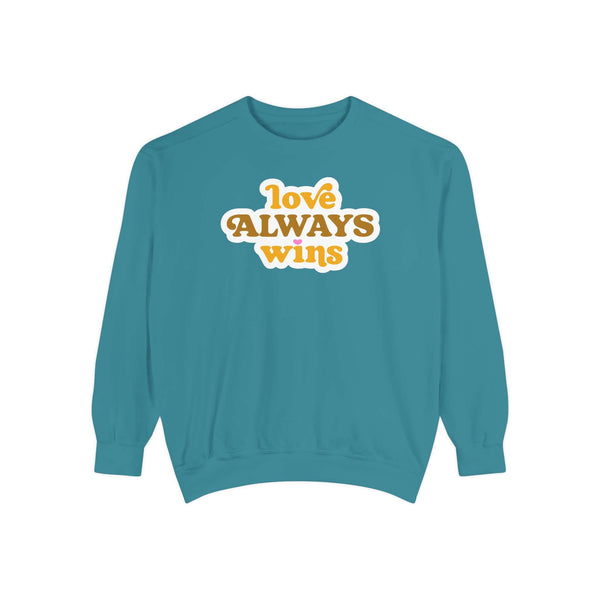 love always wins sweatshirt in teal with colorful graphic design displaying 'love ALWAYS wins'.