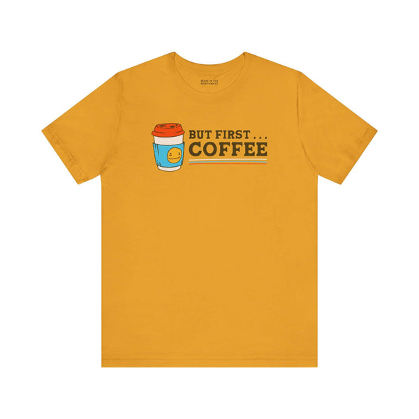 But First Coffee T Shirt featuring a coffee cup graphic on a yellow tee shirt.