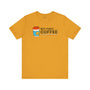 But First Coffee T Shirt featuring a coffee cup graphic on a yellow tee shirt.