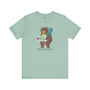 Bear's Big Northwest Adventure soft tee featuring a bear with a backpack, promoting exploration and outdoor fun.