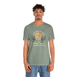 Man wearing Adventure Is Out There And So Are Serial Killers soft tee, perfect for true crime and outdoor enthusiasts.