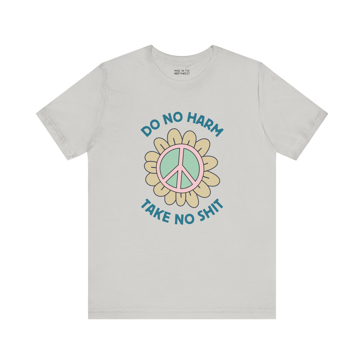 Graphic tee featuring 'Do No Harm, Take No Sh!t' with a peace flower design. Soft and stylish for good vibes.