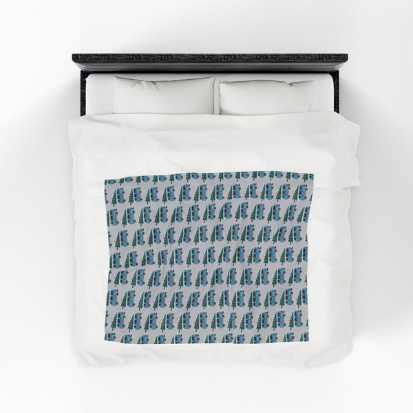 Camper van blanket featuring vintage Volkswagen buses in a repeated pattern for cozy holiday adventures.
