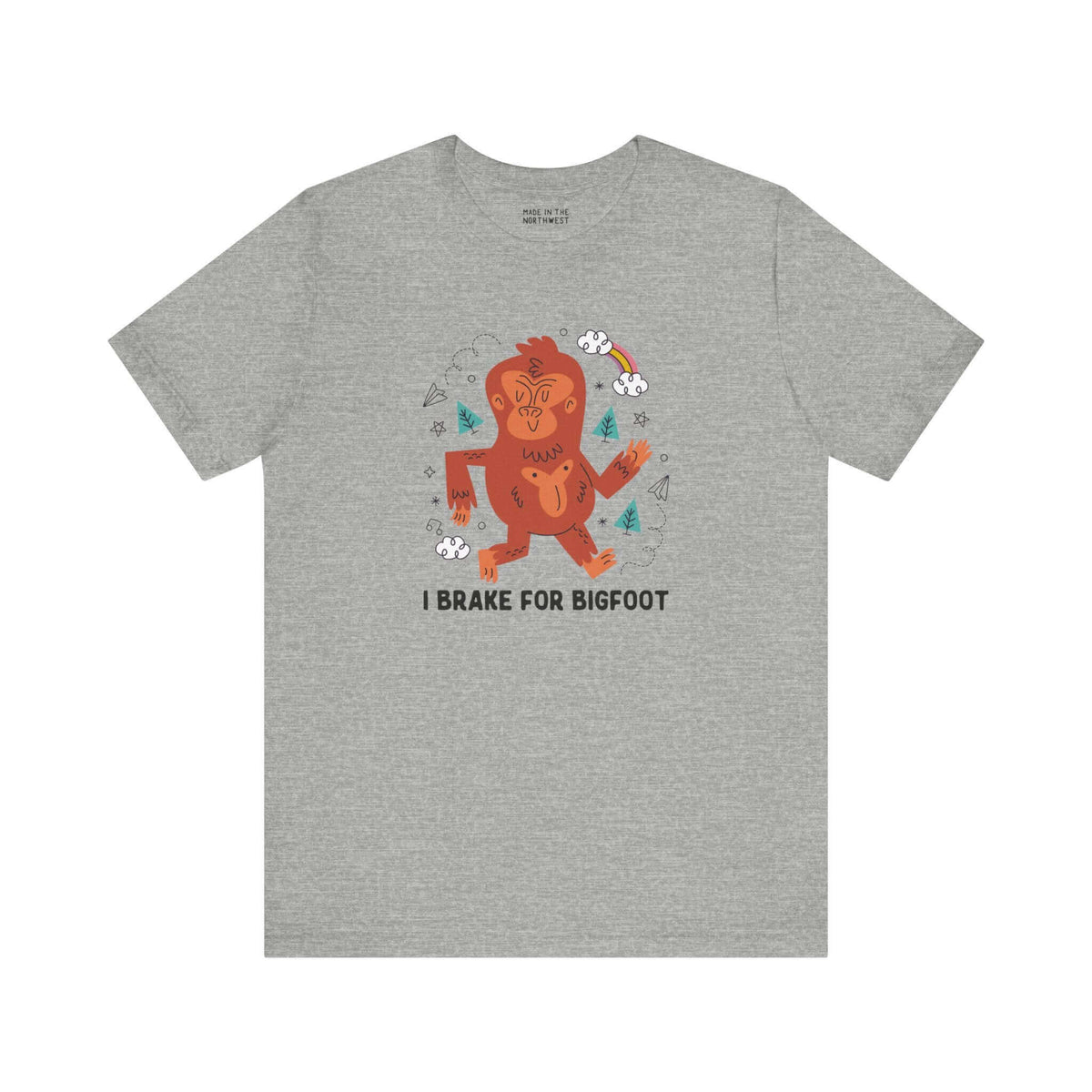 I Brake for Bigfoot Soft Tee Show your playful side and love for local folklore with our "I Brake for Bigfoot" Sasquatch Tee. This fun design features the phrase "I Brake for Bigfoot" alongside a whimsical graphic of a Sasquatch, perfect for those who enj