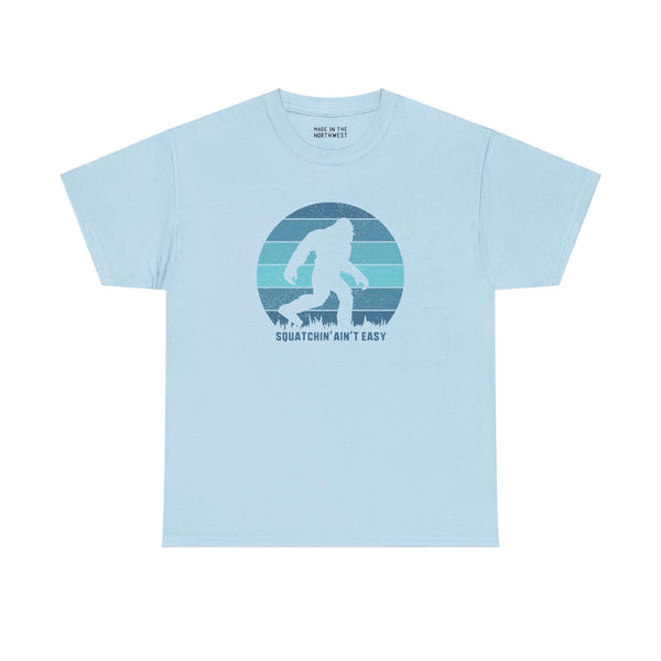 Light blue Squatchin' Ain't Easy athletic tee with Bigfoot silhouette, perfect for Sasquatch enthusiasts and Northwest legend fans.