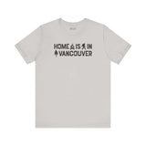 Home Is in Vancouver Tee featuring campfire, Bigfoot, and tree design, celebrating PNW Couve Pride.