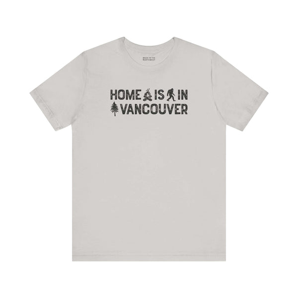 Home Is in Vancouver Tee featuring campfire, Bigfoot, and tree design, celebrating PNW Couve Pride.