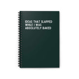 Spiral notebook titled 'Ideas That Slapped While I Was Absolutely Baked' with a dark green cover and white text.
