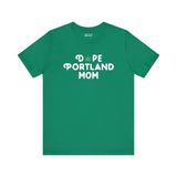 Dope Portland Mom premium soft tee in green, featuring a marijuana leaf in place of the 'O' in 'Dope'.