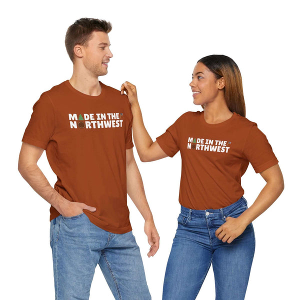 Couple wearing "Made in the Northwest" tees in brown, showcasing regional pride and casual style.