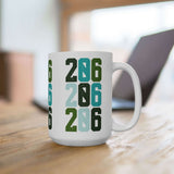 Two-Oh-Six Pop Seattle Ceramic Mug showcasing bold 206 design with vibrant colors on wooden table.