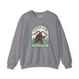 Gray sweatshirt featuring a Sasquatch holding a coffee cup with the phrase 