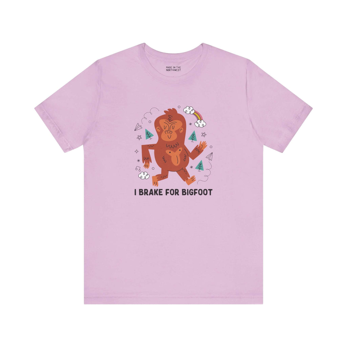 Light pink t-shirt featuring a whimsical Sasquatch graphic and the text 'I Brake for Bigfoot'.