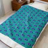 Rain & Runways Umbrella Pattern PNW Lightweight Cozy Blanket featuring colorful umbrellas on a teal background.