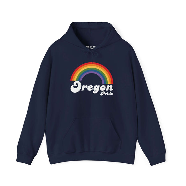 Navy hoodie featuring a vibrant rainbow design with the text 'Oregon Pride' celebrating love and inclusivity.