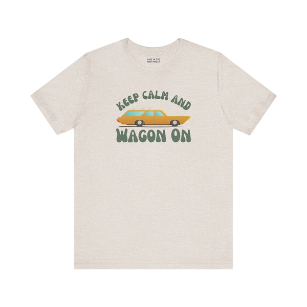 Keep Calm and Wagon On premium soft tee featuring a retro '68 Chevelle wagon graphic on a light beige shirt.