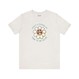 What a F*cked Up Time to Be Alive premium soft tee featuring a smiling daisy design on a light background.