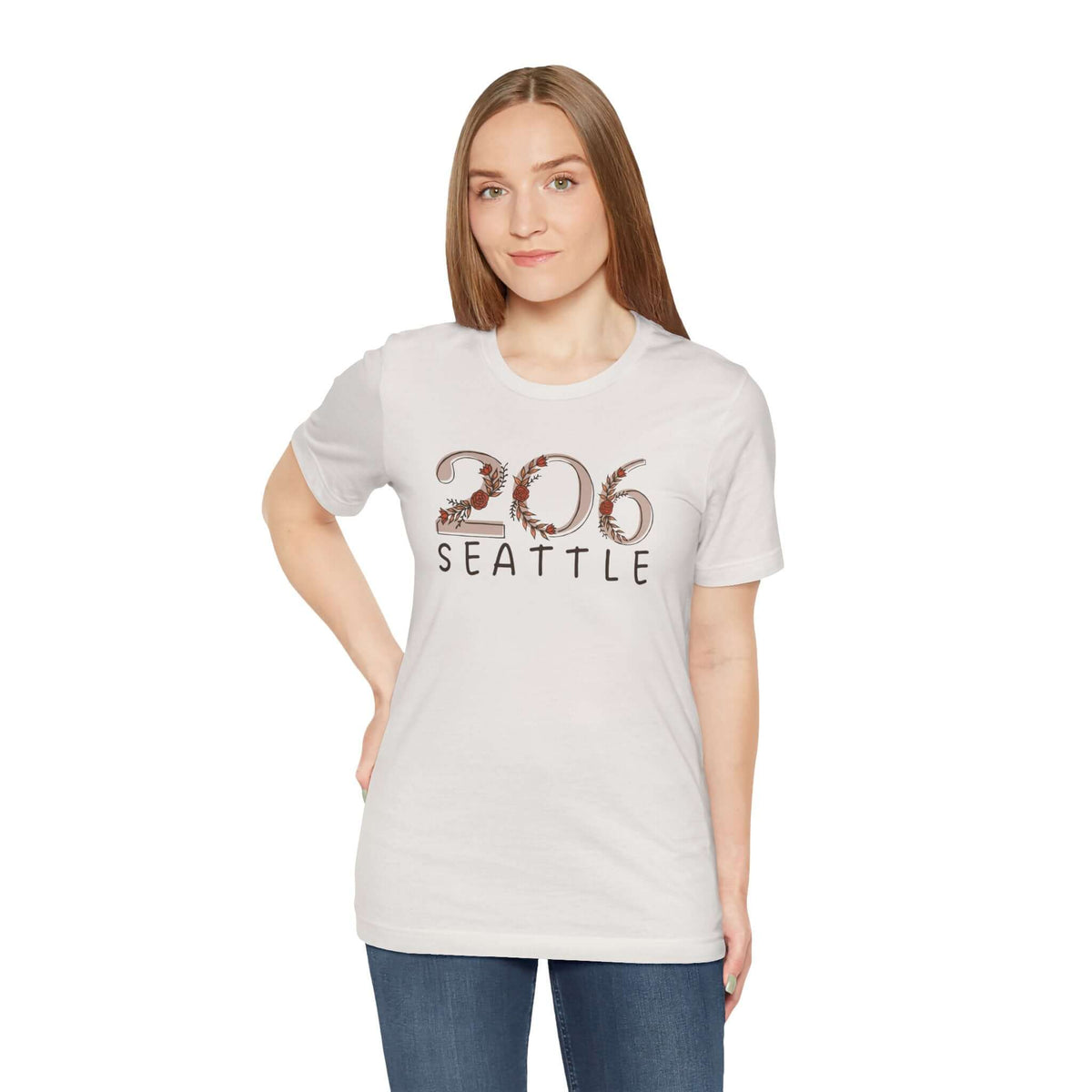 Woman wearing a 206 Floral Area Code Premium Soft Tee in white, showcasing Seattle pride in style.