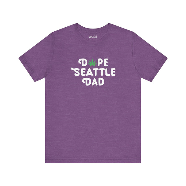 Dope Seattle Dad Soft Tee in purple featuring a marijuana leaf graphic, celebrating Seattle dad vibes.