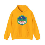 Yellow Seattle hoodie with 90s retro badge featuring trees, symbolizing Emerald City pride and Pacific Northwest nature.