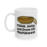 Thick and salty Northwest geoduck clam ceramic mug design with bold graphics and humorous text.