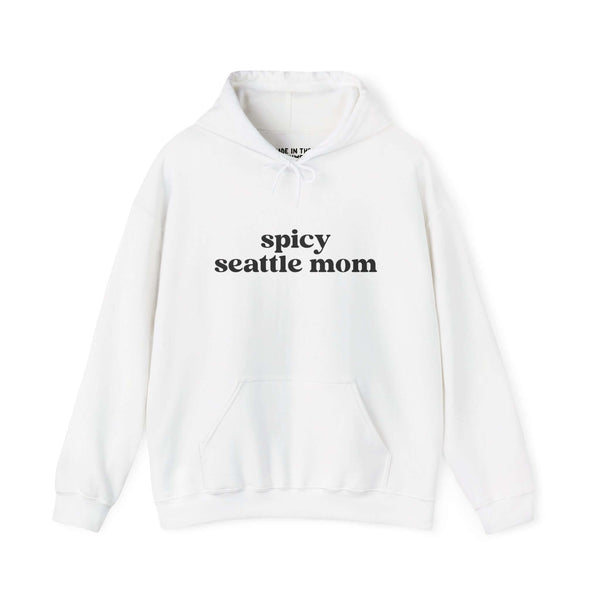 Cozy white hoodie with 'spicy seattle mom' text, perfect for stylish Seattle moms.