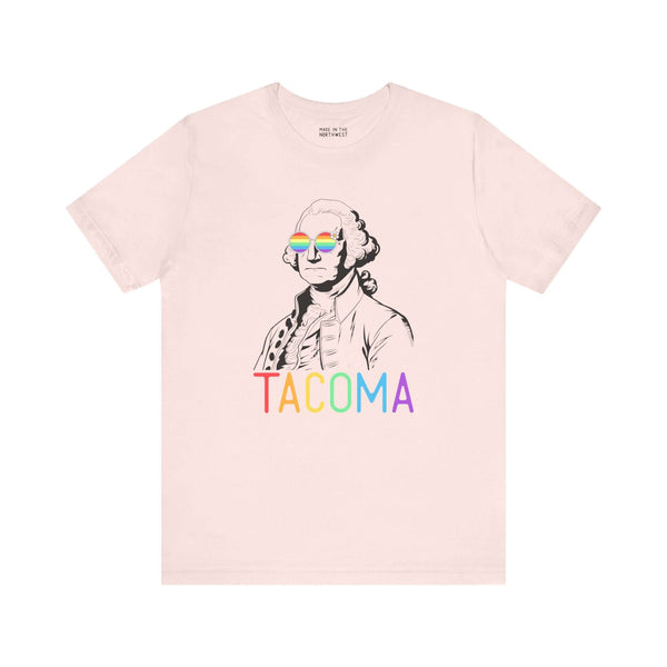 Pride-themed Tacoma tee with rainbow lettering and line art of a historical figure wearing rainbow glasses.