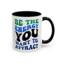Be the Energy You Want to Attract Mug with colorful retro-style typography on glossy white ceramic.