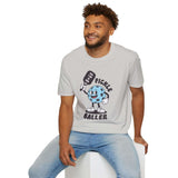 Man wearing a light gray Pickle Baller T Shirt featuring a playful pickleball character.
