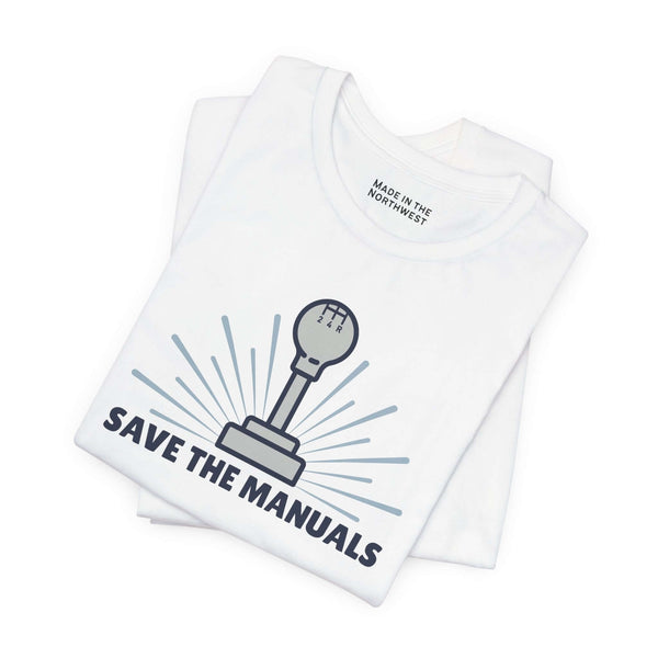Save the Manuals T Shirt featuring a minimalist gearshift graphic on a white tee, perfect for car enthusiasts.