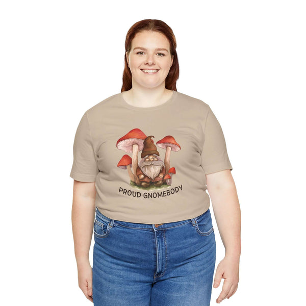 Woman wearing a Proud Gnomebody premium soft tee featuring a gnome and mushrooms, celebrating cozy homebody lifestyle.