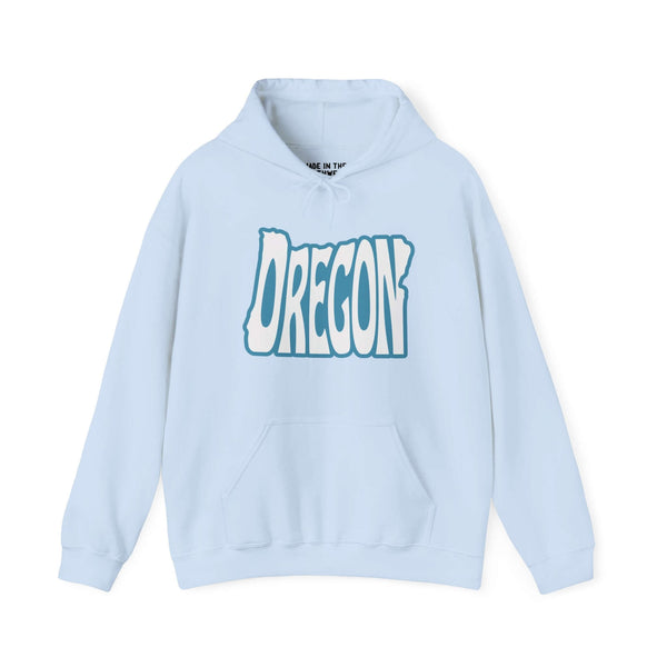 Light blue hoodie with "Oregon" typography design shaped like the state, celebrating Pacific Northwest pride.