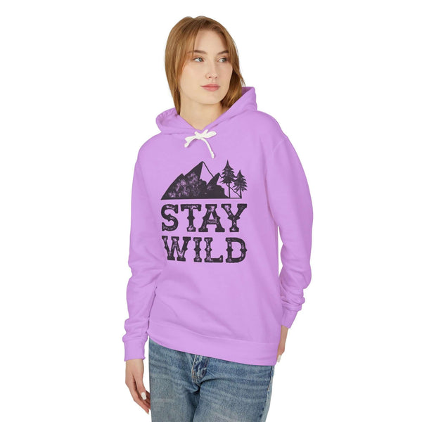Stay Wild hoodie in lavender color featuring mountain and tree graphics, perfect for outdoor enthusiasts.