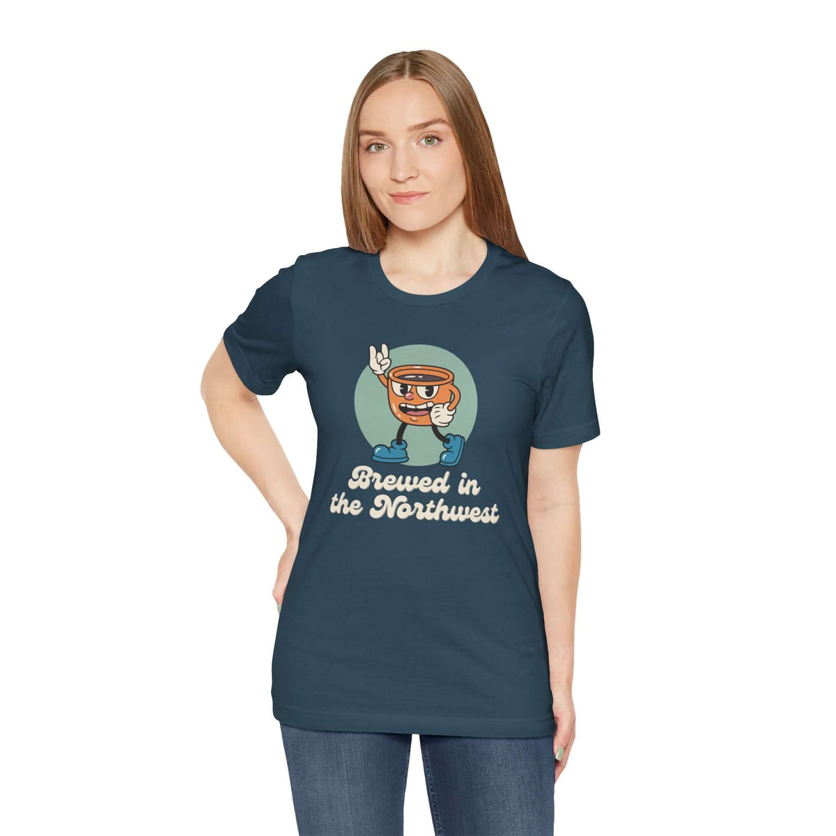 Person wearing Brewed in the Northwest coffee-themed soft tee, showcasing PNW pride and casual style.