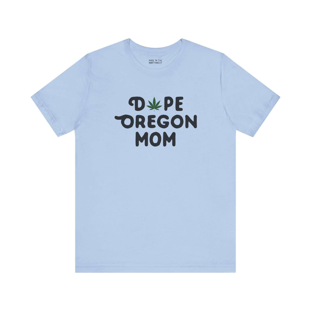 Light blue tee with "Dope Oregon Mom" text, featuring a marijuana leaf symbol replacing the "O" in "Dope."