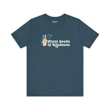 Plant Seeds of Kindness premium soft tee featuring a peace sign and floral design, perfect for free spirits and gardeners.