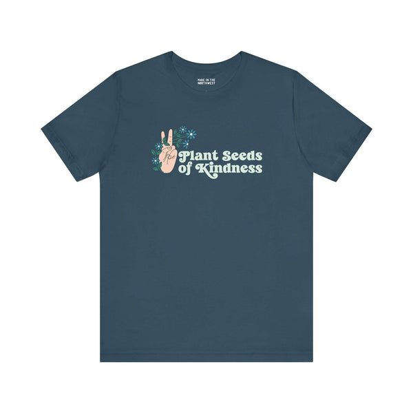 Plant Seeds of Kindness premium soft tee featuring a peace sign and floral design, perfect for free spirits and gardeners.