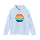 Light blue hoodie with circular Left Coast Heritage logo, celebrating Spokane, Washington and Pacific Northwest culture.