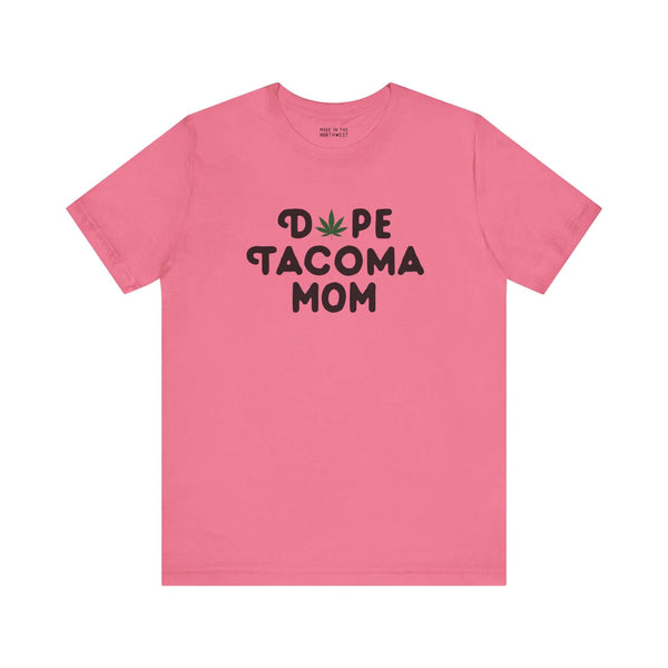 Pink "Dope Tacoma Mom" soft tee with marijuana leaf logo, celebrating Washington's local vibe.